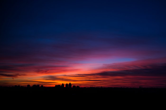 Toronto skyline at sunset with colorful clouds