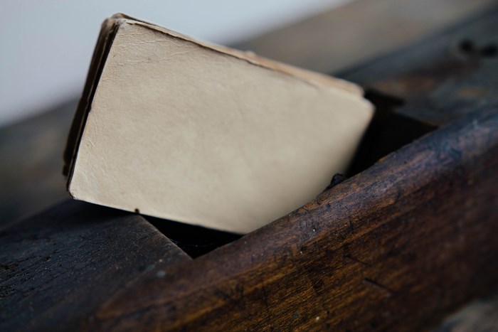 Old book on a wooden surface