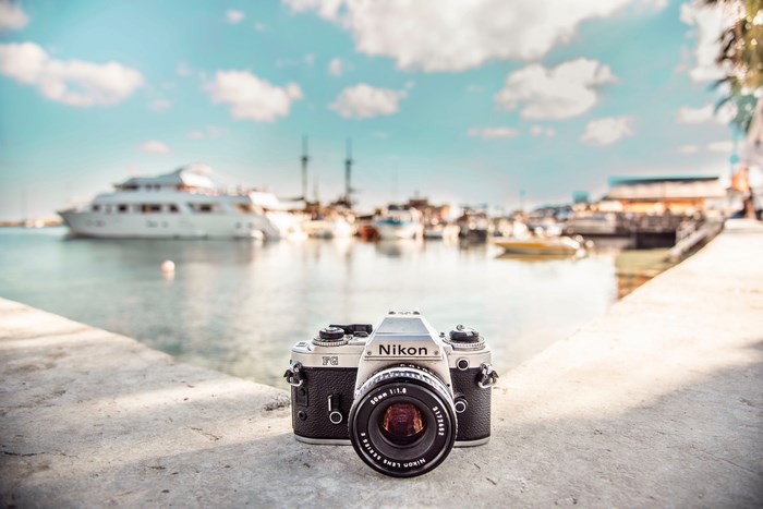 Nikon camera in a harbor with yachts and boats