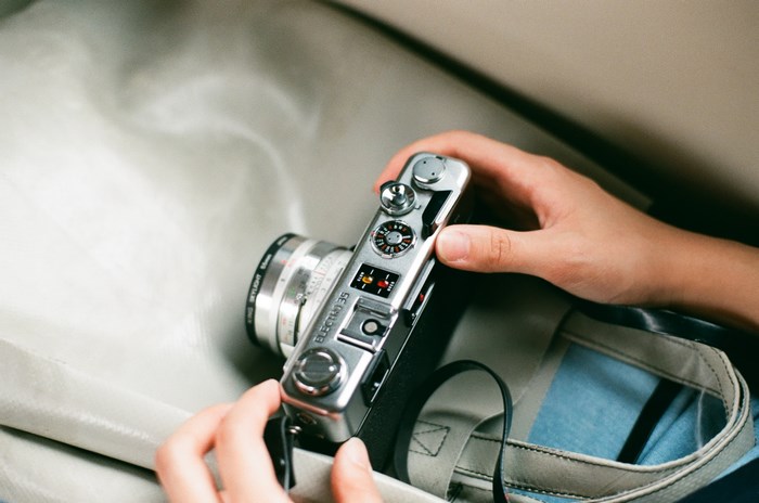 Yashica Electro 35 camera held by hands