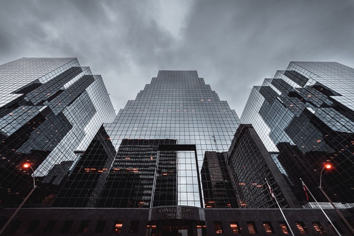 Constitution Square skyscrapers under a cloudy sky
