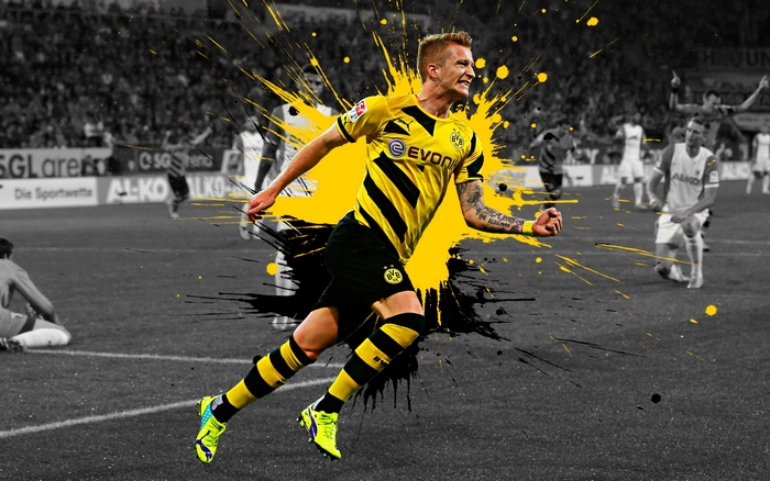 Marco Reus of Borussia Dortmund celebrating on a soccer field
