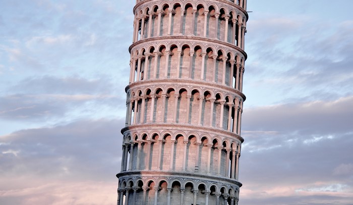 The Leaning Tower of Pisa against a cloudy sky