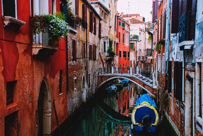 Historic Venetian Canal with Bridge and Colorful Buildings