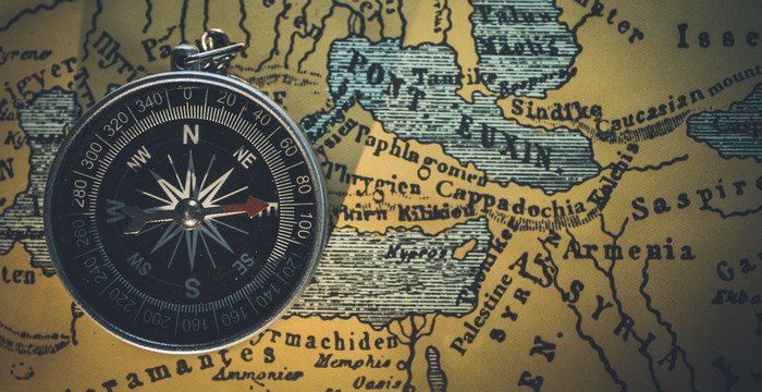 Compass on an antique map of Armenia and the East