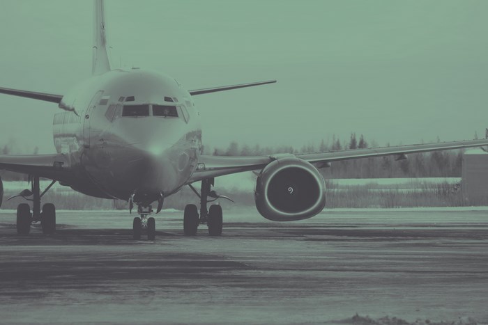 Boeing 737 airplane on a runway in winter