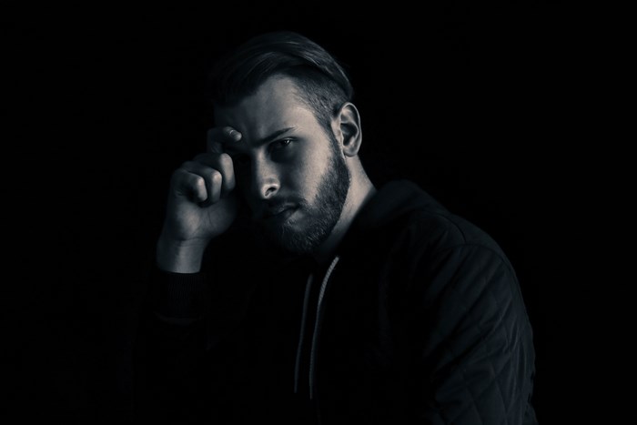 Monochrome portrait of a man with a beard