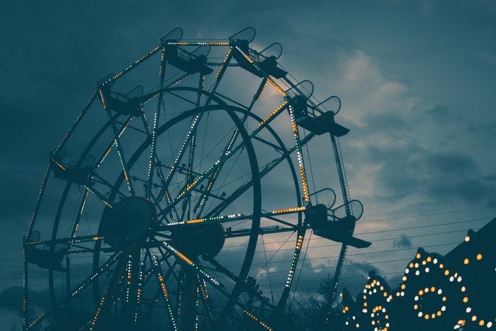 Ferris wheel with lights at dusk