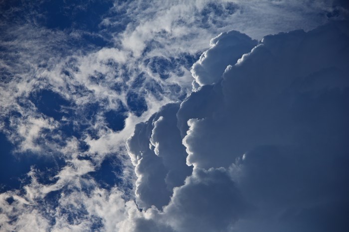 Majestic Cumulus Clouds in Blue Sky