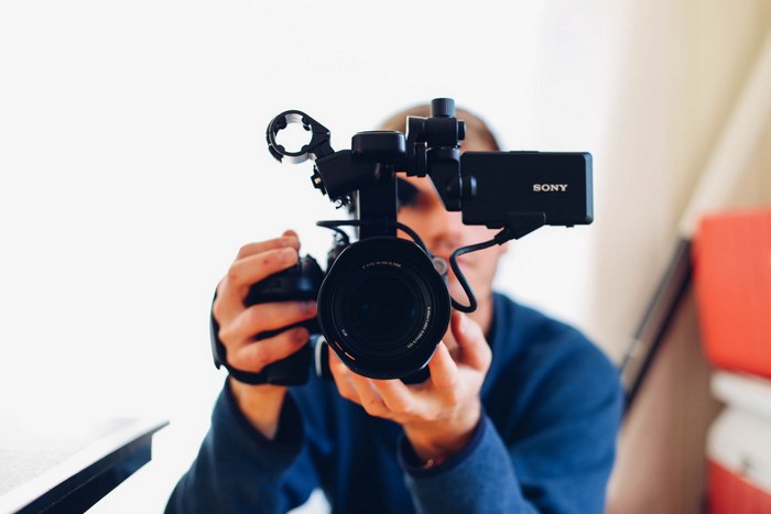 Man holding a Sony video camera