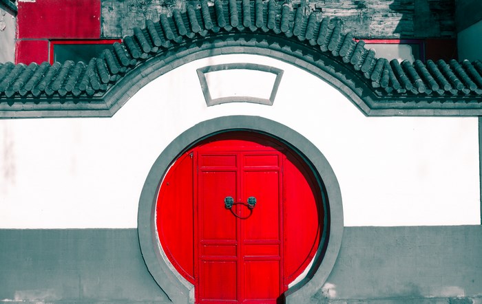 Traditional Chinese Round Doorway with Red Doors