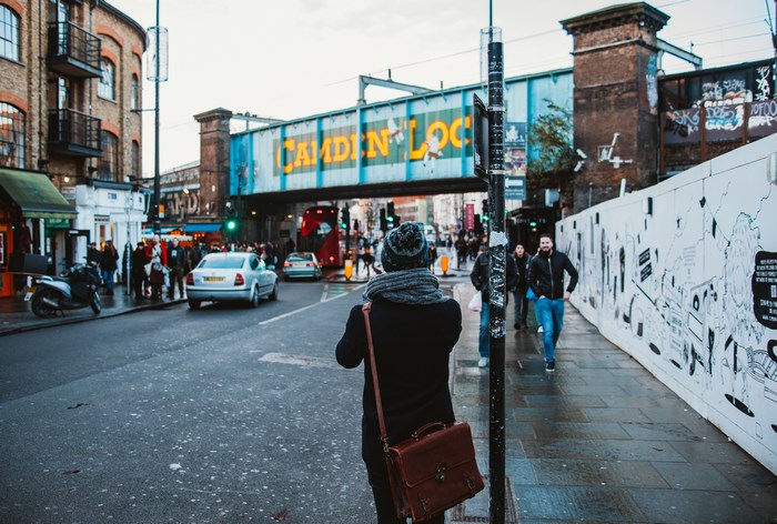 Camden Lock Bridge with people and cars in London