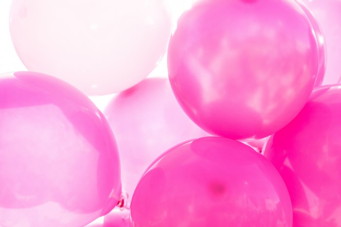 Pink and white balloons close up