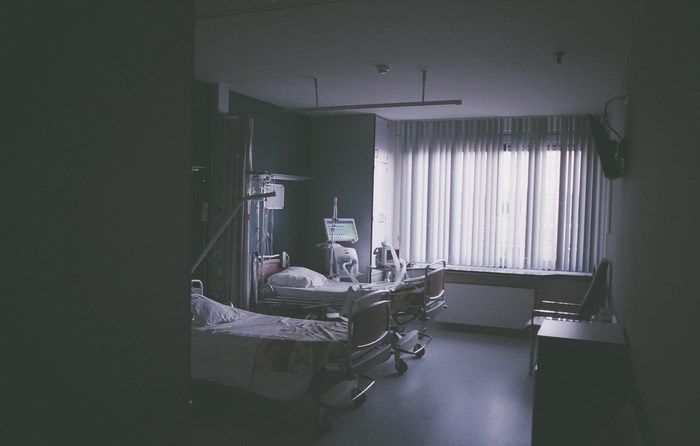 Hospital room with beds and medical equipment