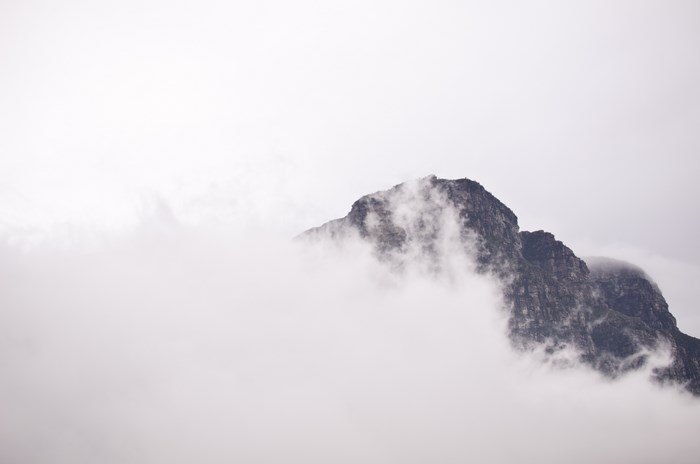 Mountain peak shrouded in mist