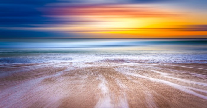 Vivid Sunrise Over Australian Ocean Shore with Motion Blur