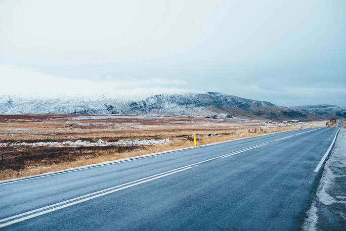 Roadside view of a snow-capped mountain in Iceland