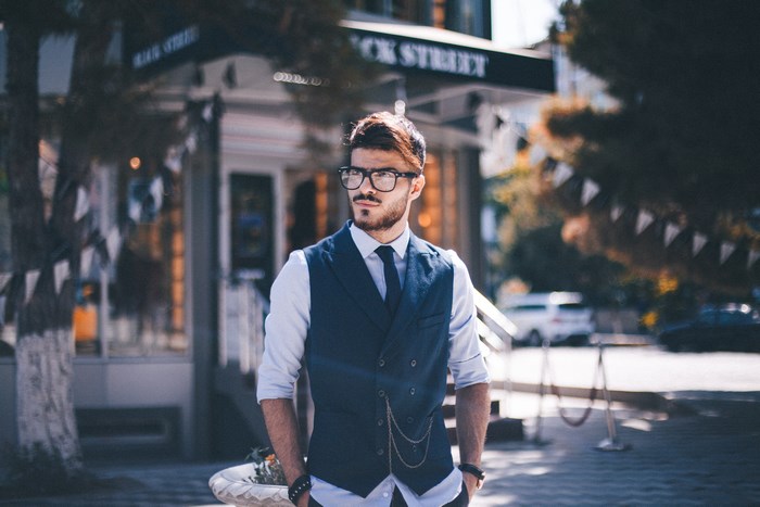 Man in suit and glasses on Baku street