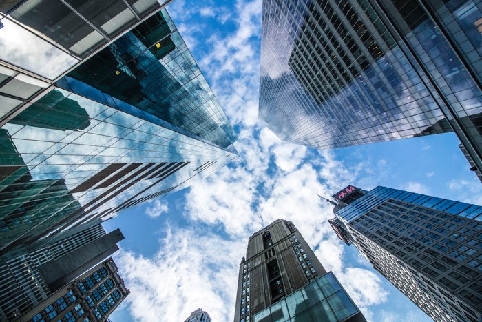 Skyscrapers reflecting the sky and clouds