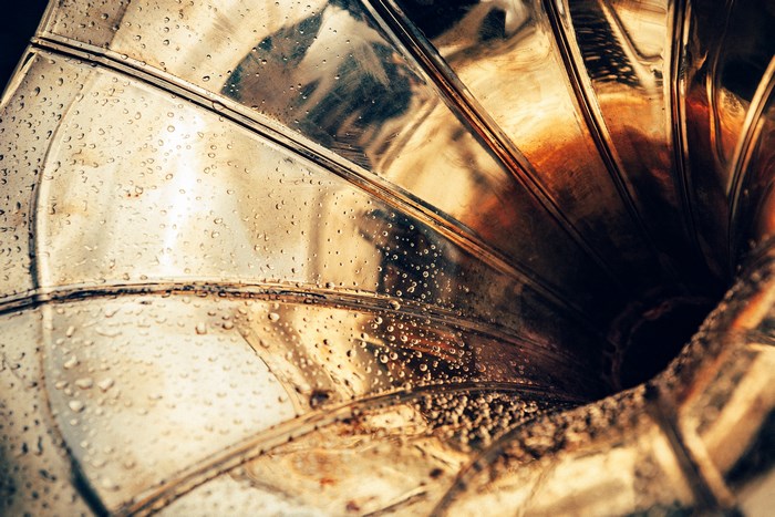 Close-up of a wet vintage gramophone horn