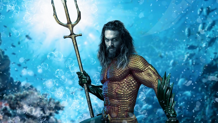 Aquaman from DC Comics holding a trident underwater