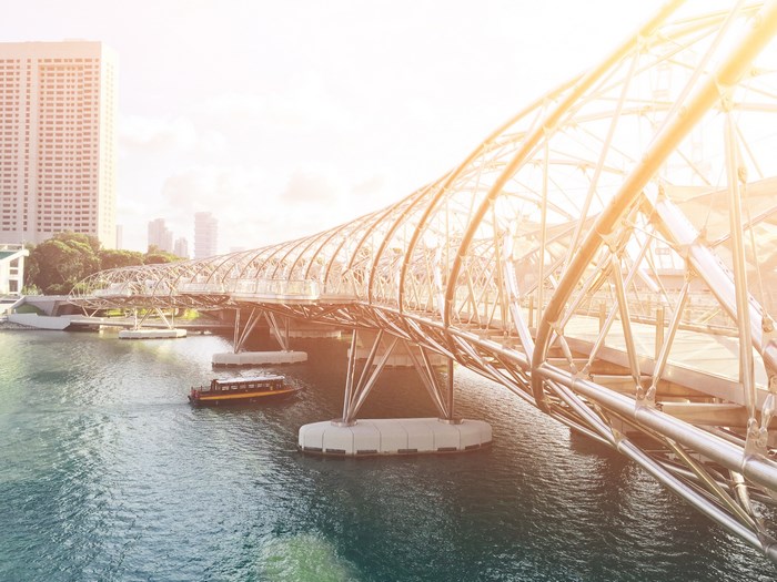 Helix Bridge over Singapore River at sunrise
