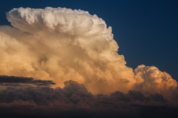 Cumulonimbus cloud formation illuminated by sunlight