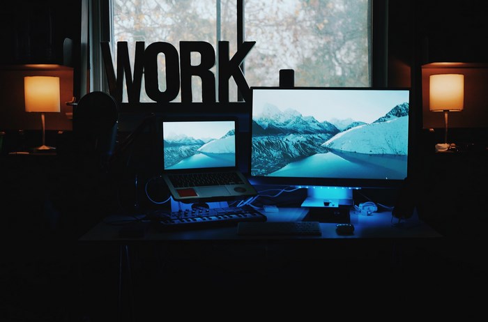 Work desk with dual monitors and laptop