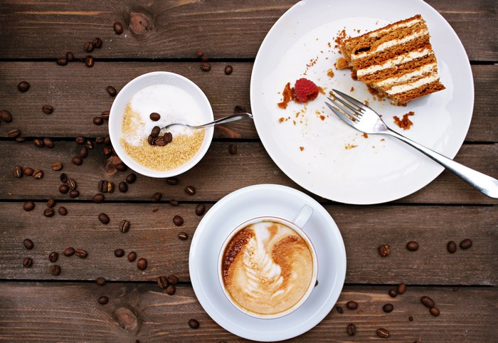 Coffee, Cake, and Sugar on a Wooden Table