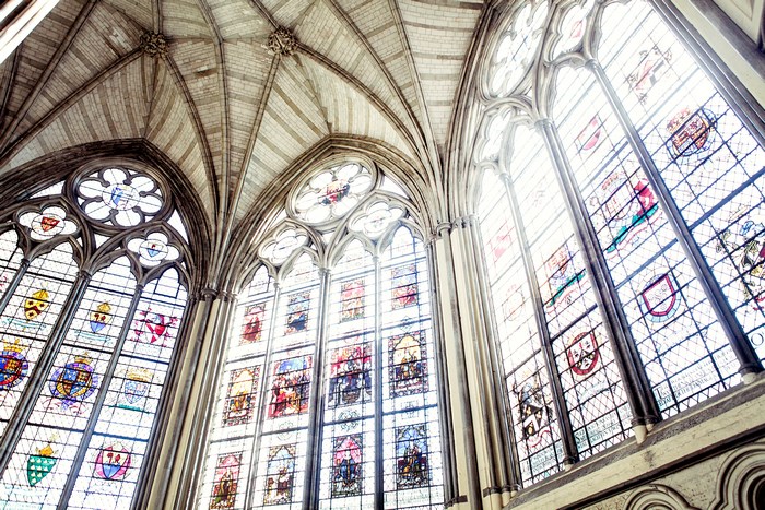 Sunlit Stained Glass Windows in Cathedral Ceiling