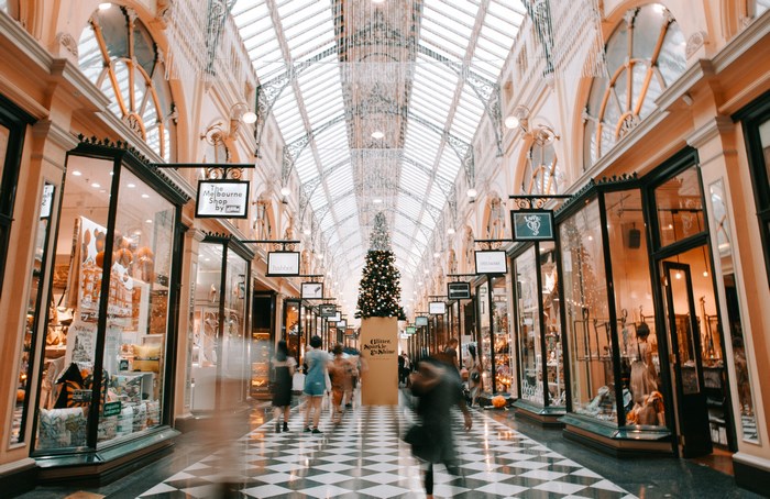 Christmas tree in a shopping arcade with people