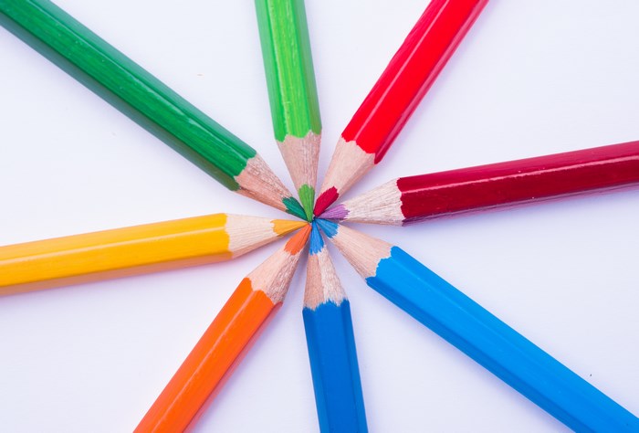 Colorful pencils arranged in a circle