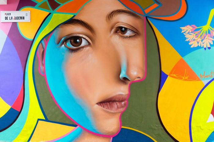 Surrealistic Female Face with Vibrant Abstract Colors in Málaga