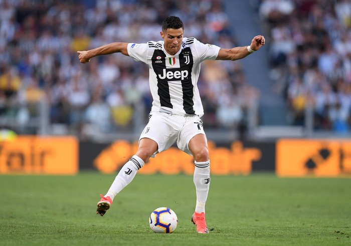 Cristiano Ronaldo playing soccer for Juventus
