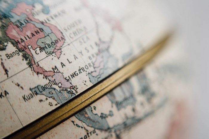 Close-up of a vintage globe showing Southeast Asia