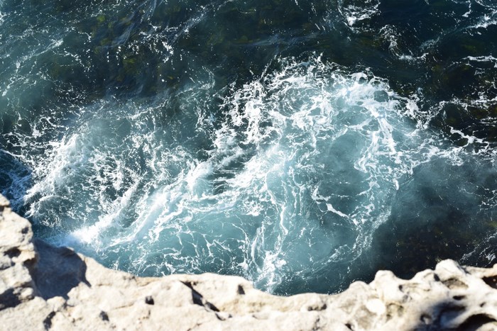 Waves crashing against a rocky coast