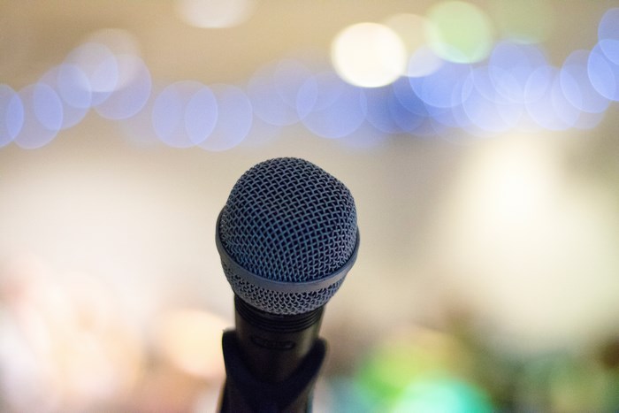 Close up of a microphone with bokeh background