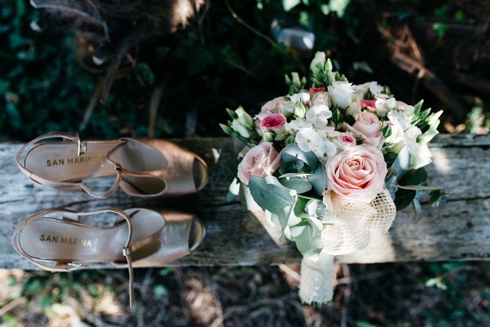 San Marina Shoes and Wedding Bouquet on Wooden Bench