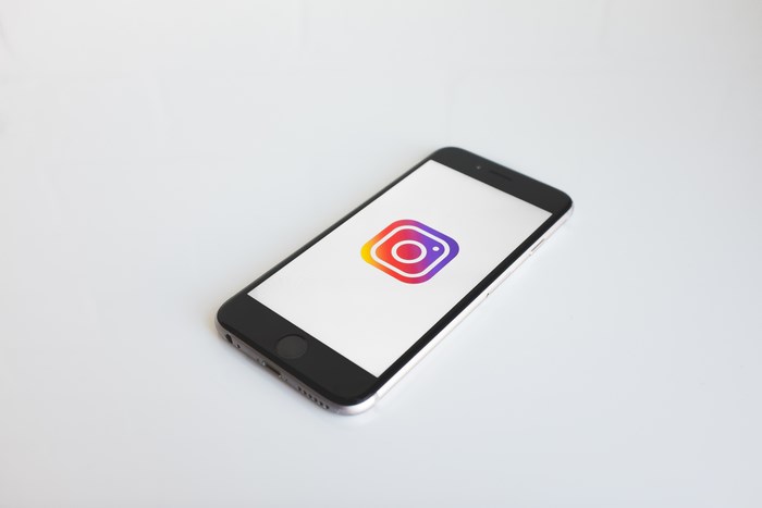Smartphone Displaying Instagram Logo on Screen