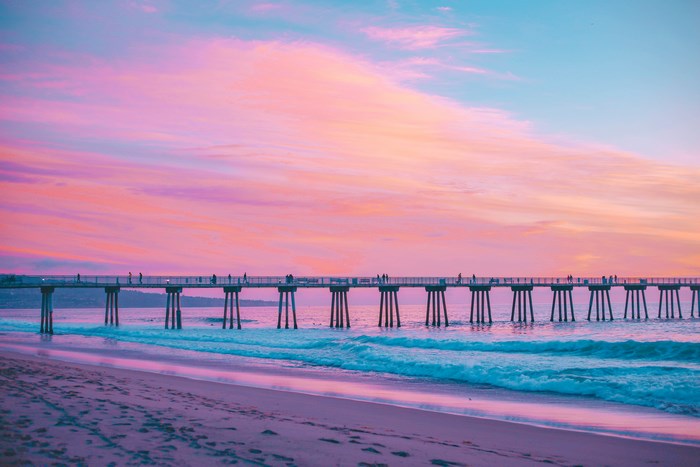 Sunset Over Pier with Pink and Blue Sky