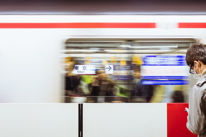 Commuter waiting for train in Tokyo