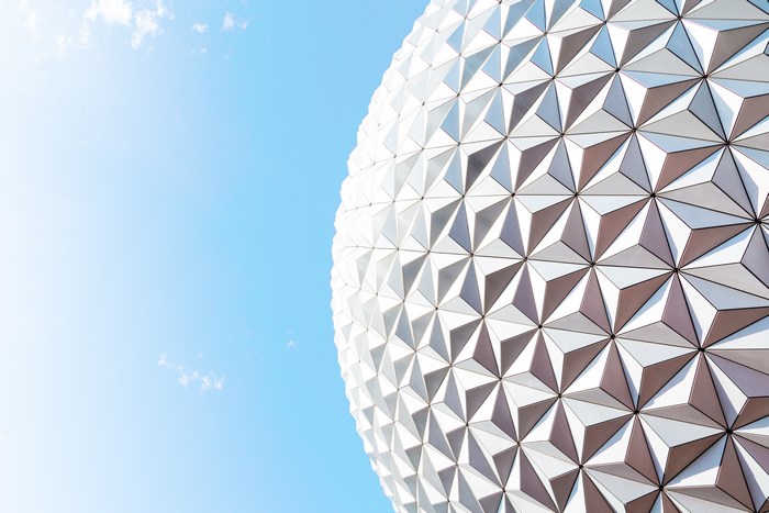Spaceship Earth facade against a bright blue sky