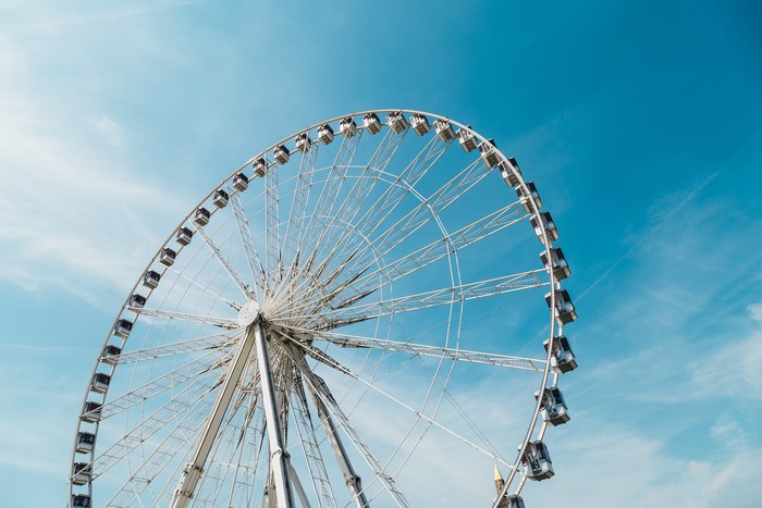 Ferris wheel against a blue sky