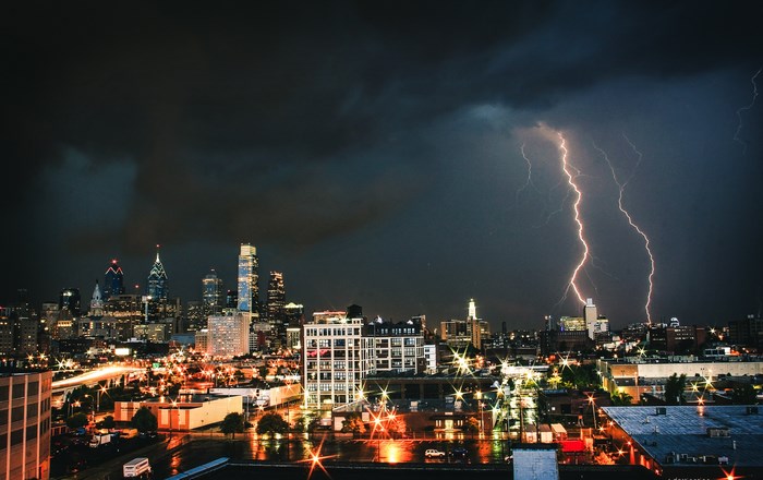 Lightning strikes over the Philadelphia skyline at night