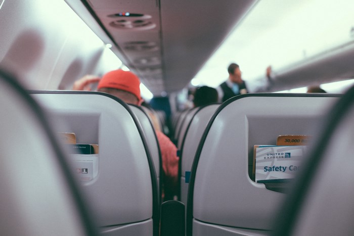United Express airplane interior with passengers