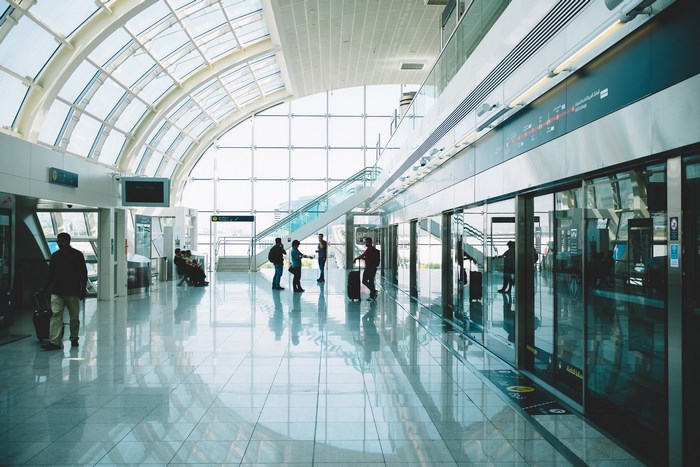 Dubai Metro Station Interior with People and Luggage