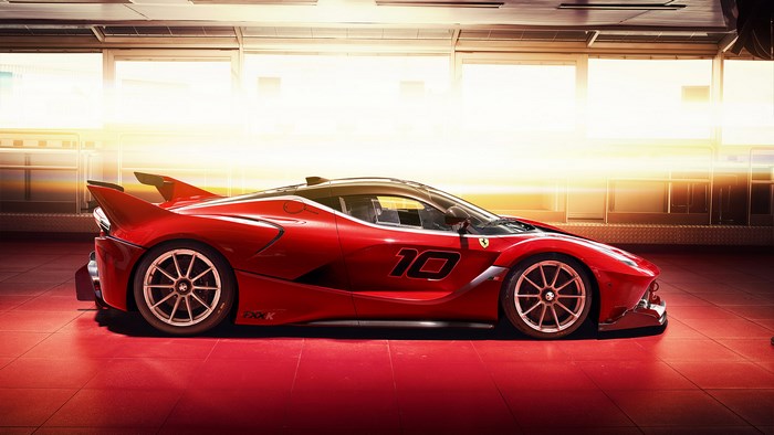 Red Ferrari FXX-K race car with number 10