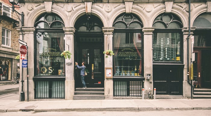 Restaurant Santos entrance with a man
