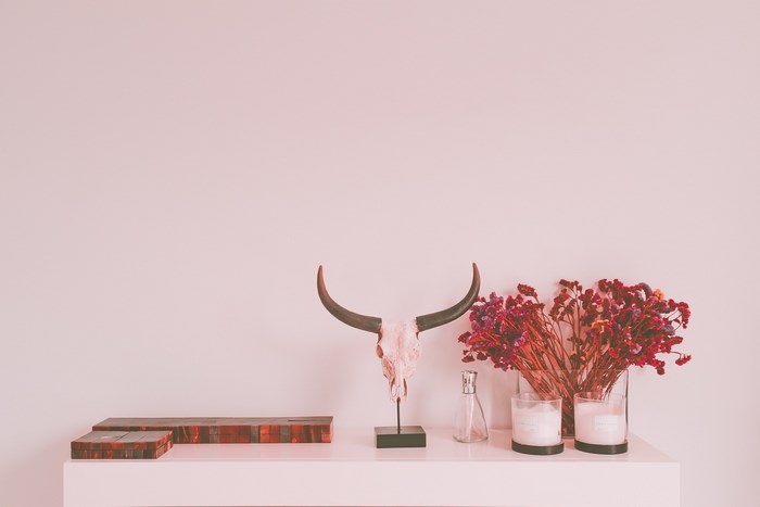 Bull skull decoration with dried flowers and candles