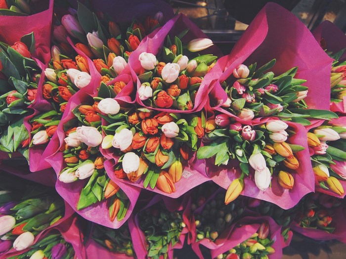 Bouquets of colorful tulips at a flower market